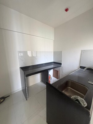 Kitchen in 1 BHK Apartment at Runwal Gardens, Dombivli East – for Rent