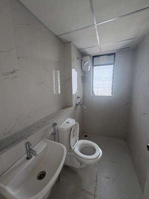 Bathroom in 1 BHK Apartment at Runwal Gardens, Dombivli East – for Rent