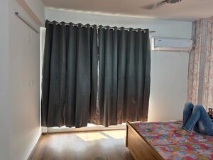 Bedroom in 3.5 BHK Apartment at Ansal Sushant Jeevan Enclave, Sushant Golf City – for Rent