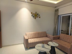 Living Room in 1 BHK Apartment at Orange County Gathagram, Dehu – for Sale