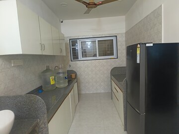 Kitchen in 1 BHK Apartment at Orange County Gathagram, Dehu – for Sale