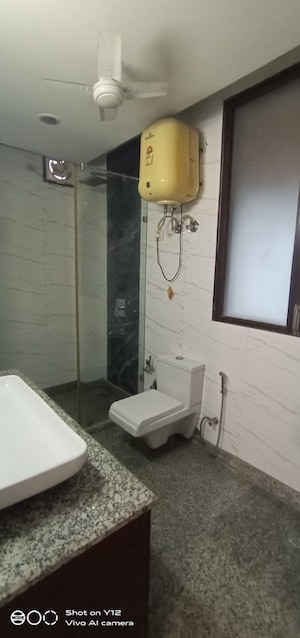 Bathroom in 4 BHK Builder Floor at Greater Kailash I – for Rent