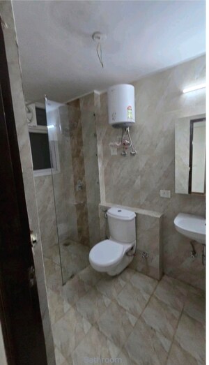 Bathroom in 3 BHK Apartment at Spazedge, Sector 47 – for Rent