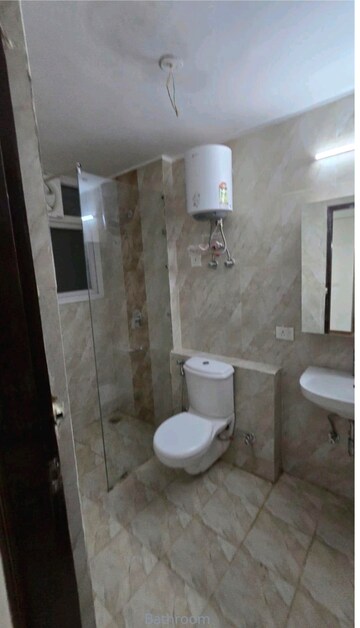Bathroom in 3 BHK Apartment at Spazedge, Sector 47 – for Rent