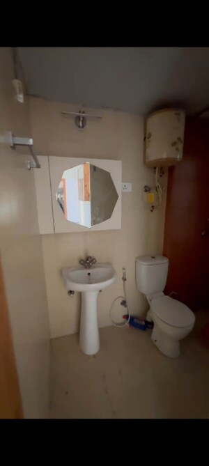 Bathroom in 2.5 BHK Apartment at Mahagun Mywoods, Sector 16c Greater Noida – for Sale