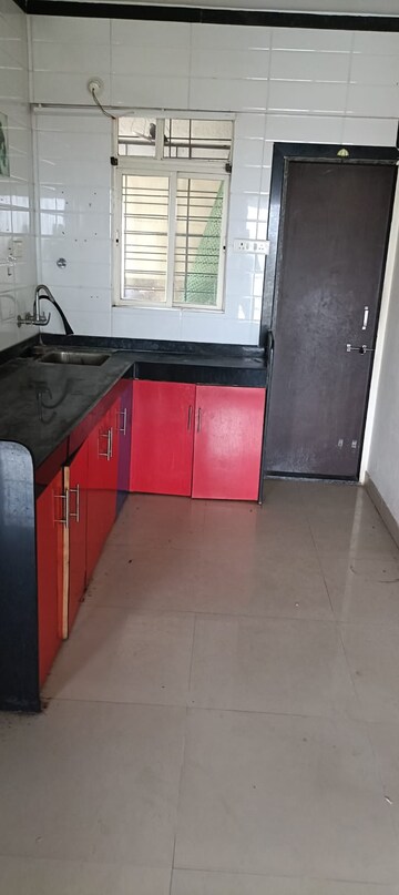 Kitchen in 2 BHK Apartment at Mittal Arcvista, Dhanori – for Rent