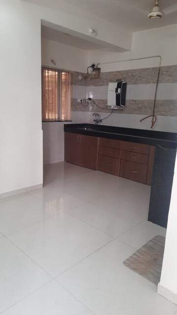 Kitchen in 2 BHK Apartment at GK Peace Valley, Pimple Saudagar – for Rent