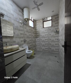 Bathroom in 2 BHK Builder Floor at Chattarpur – for Rent