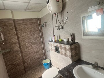Bathroom in 3 BHK Apartment at NK Sharma Savitry Greens, Lohgarh – for Rent