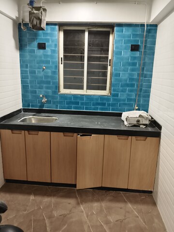 Kitchen in 1.5 BHK Apartment at Vile Parle West – for Rent