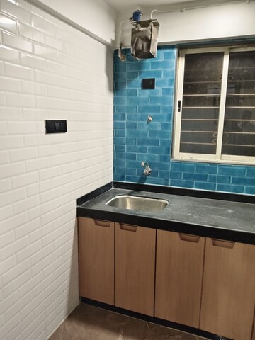 Kitchen in 1.5 BHK Apartment at Vile Parle West – for Rent
