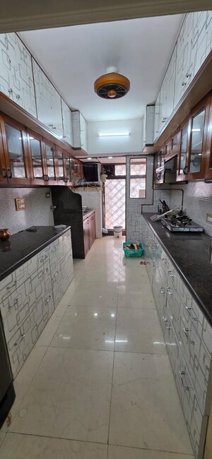 Kitchen in 3 BHK Apartment at Goyal Lakshchandi Heights, Goregaon East – for Rent