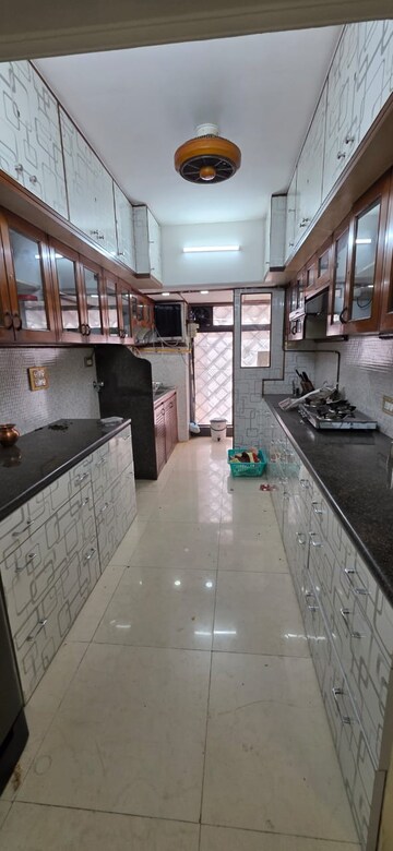 Kitchen in 3 BHK Apartment at Goyal Lakshchandi Heights, Goregaon East – for Rent