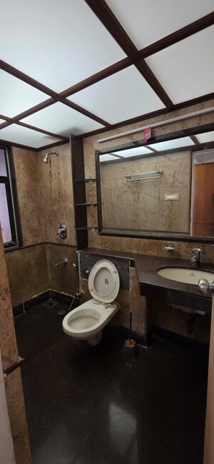 Bathroom in 3 BHK Apartment at Goyal Lakshchandi Heights, Goregaon East – for Rent