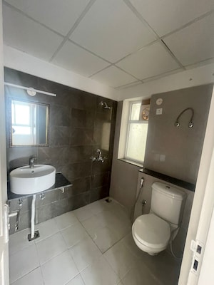 Bathroom in 3 BHK Apartment at International Airport Road – for Sale
