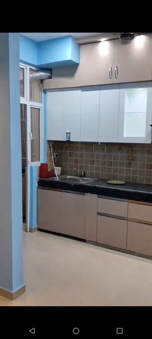 Kitchen in 3 BHK Apartment at Mahagun Mywoods, Sector 16c Greater Noida – for Rent