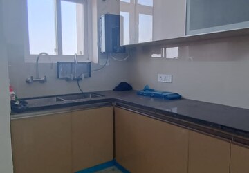 Kitchen in 2 BHK Apartment at Artique Uptown Skylla, International Airport Road – for Rent