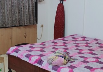 Bedroom in 2 BHK Apartment at Bindra Complex, Andheri East – for Rent
