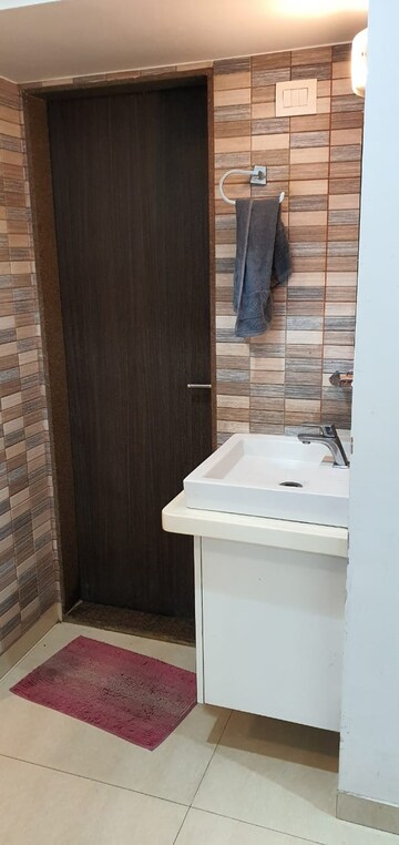 Bathroom in 2 BHK Apartment at Hiranandani Estate Flamingo, Ghodbunder Road – for Rent