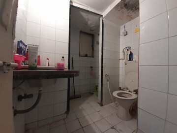 Bathroom in 2 BHK Apartment at Royal Palms, Goregaon East – for Rent