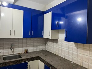 Kitchen in 2 BHK Apartment at Gaur Atulyam, Omicron I Greater Noida – for Sale