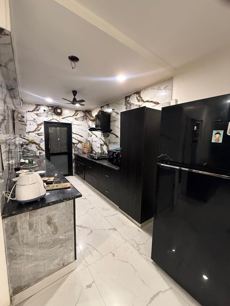 Kitchen, paschim vihar 3 Bedroom 1200 Sq.Ft. Apartment In Paschim Vihar Delhi 9382309