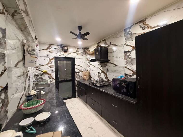 Kitchen, paschim vihar 3 Bedroom 1200 Sq.Ft. Apartment In Paschim Vihar Delhi 9382309