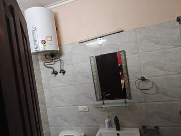 Bathroom in 3 BHK Apartment at Aditya Mega City, Vaibhav Khand – for Rent