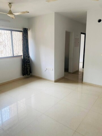Living Room in 1 BHK Apartment at Lodha Palava Downtown, Dombivli East – for Sale