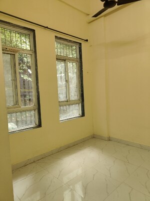 Room in 2 BHK Apartment at Royal Palms, Goregaon East – for Rent