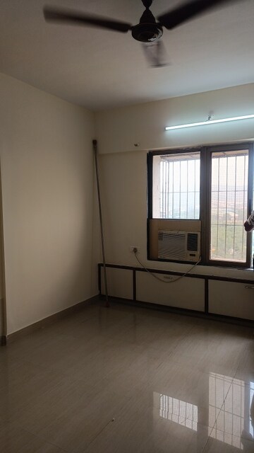 Room in 2 BHK Apartment at Ajmera Manhattan, Bhakti Park – for Sale