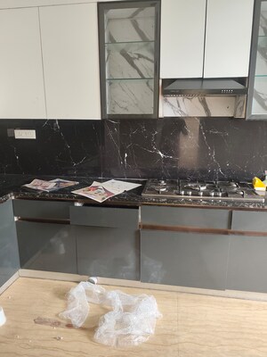 Kitchen in 4 BHK Apartment at Mahagun Mezzaria, Sector 78 – for Rent