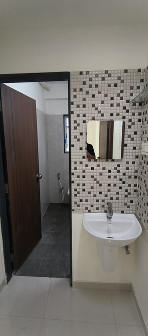 Bathroom in 3 BHK Apartment at Sonigara Presidency, Ravet – for Rent
