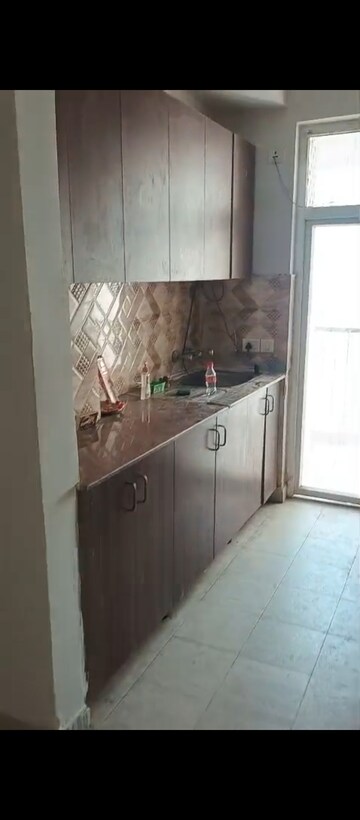 Kitchen in 2 BHK Apartment at Amrapali Leisure Park, Amrapali Leisure Valley – for Sale
