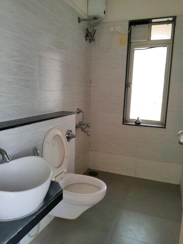 Bathroom in 1 BHK Apartment at DB Parkwoods, Kasarvadavali – for Rent