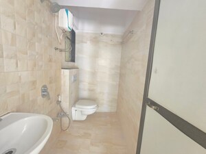 Bathroom in 2 BHK Apartment at Shiddivinayak Society, Vartak Nagar – for Sale