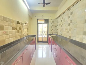 Kitchen in 2 BHK Apartment at Shiddivinayak Society, Vartak Nagar – for Sale