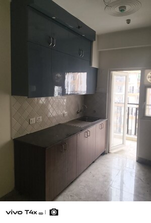 Kitchen in 3 BHK Apartment at Amrapali Terrace Homes, Tech Zone 4 Greater Noida – for Sale