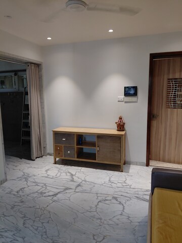 Living Room in 2 BHK Apartment at Vile Parle East – for Rent