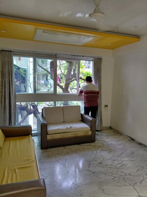 Living Room in 2 BHK Apartment at Vile Parle East – for Rent