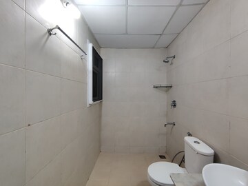 Bathroom in 2.5 BHK Apartment at Bhartiya City Nikoo Homes II, Thanisandra Main Road – for Rent