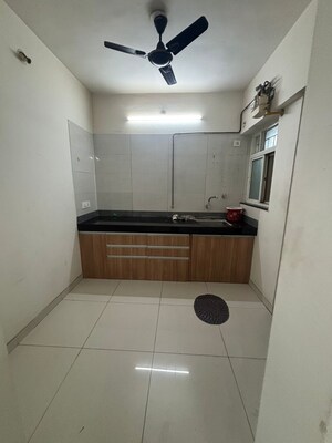 Kitchen in 2 BHK Apartment at Paranjape Richmond Park, Rahatani – for Rent