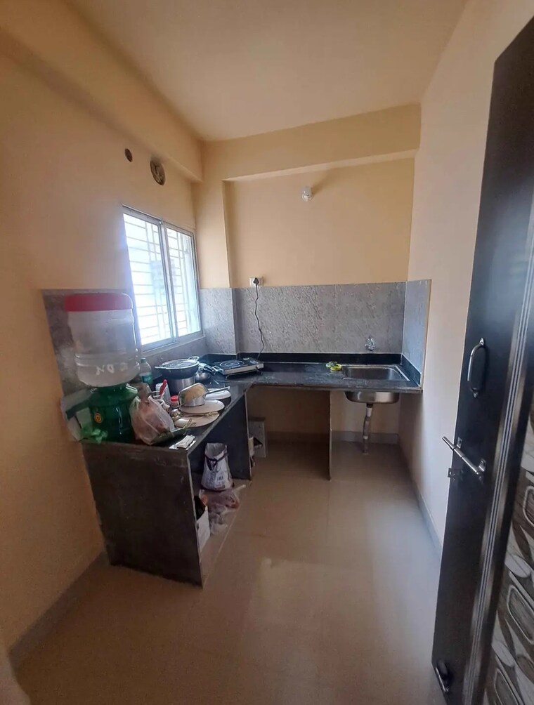 Kitchen, a zone 2 Bedroom 790 Sq.Ft. Independent House In A Zone Durgapur 9383034