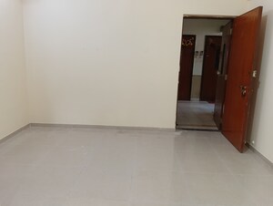 Room in 2 BHK Apartment at Bhoomi Classic, Malad West – for Rent