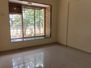 Room in 2 BHK Apartment at Bhoomi Classic, Malad West – for Rent