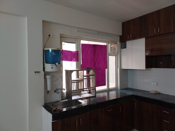 Kitchen in 2 BHK Apartment at ROF Aalayas, Sector 102 – for Sale