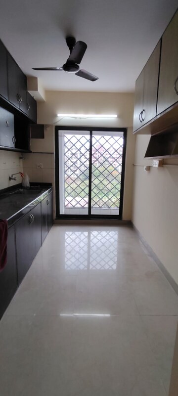 Kitchen in 3 BHK Apartment at Goyal Lakshchandi Heights, Goregaon East – for Rent