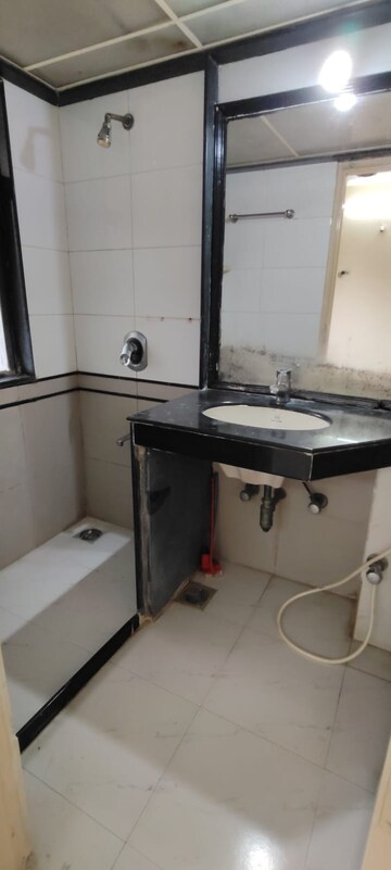 Kitchen in 3 BHK Apartment at Goyal Lakshchandi Heights, Goregaon East – for Rent