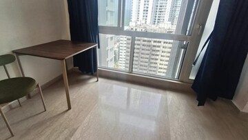 Room in 2 BHK Apartment at Omkar Signet, Malad East – for Rent