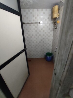 Bathroom in 1 BHK Apartment at Kanchan Pushp Society, Ghodbunder Road – for Rent